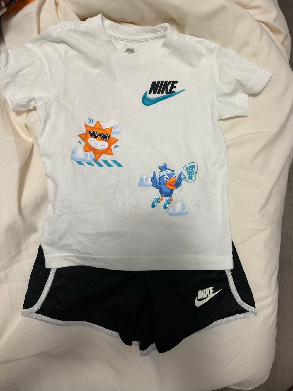 Nike White Tee with Sunny Graphic & Black Logo Shorts